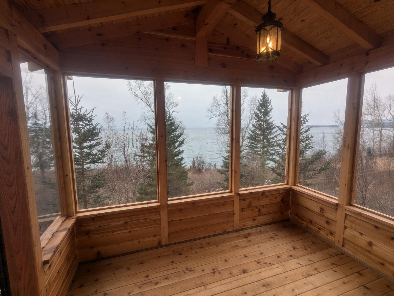 Screened porch with lake view